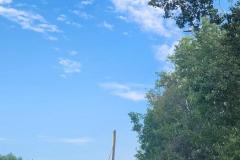 Clear blue sky with scattered clouds — County Road 11 wildland fire 2023