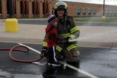 Firefighter in full protective gear — fire prevention 2023