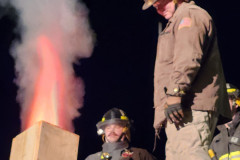 Nighttime scene with active fire — chimney fire training February 2024