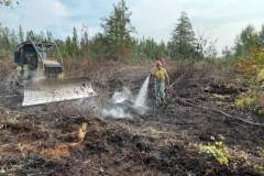 Heavy machinery clearing land — County Road 11 wildland fire 2023
