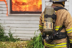 Firefighter with hose — Training Burn July 2025