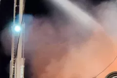 Tall structure illuminated at night — Granite Shop Fire Sturgeon Lake October 2022